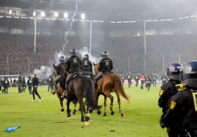 Fans and police injured in pitch invasion during ‘high risk’ German Cup tie