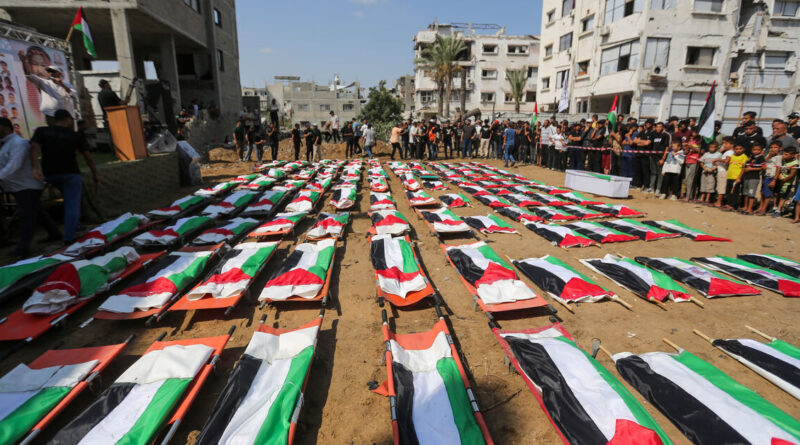 Gaza family buries 112 recovered from war rubble after Israeli strike