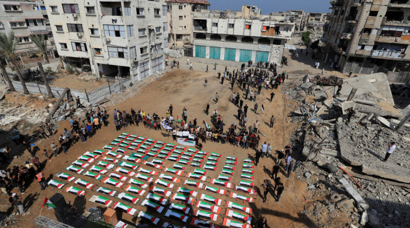 Gazans bury nearly a whole clan found in rubble in mass funeral for 112