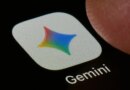 A macro close-up photograph shows the Google Gemini AI app icon