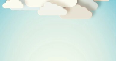 white paper cut-out clouds on blue background