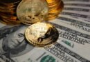 Hackers steal over $130 million by exploiting bug in offline hardware wallets | TechCrunch Bitcoin coins cryptocurrency on U.S. dollar banknotes background.