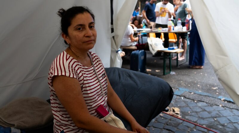 Hundreds camp on sweltering Rome street amid tussle over squatted building