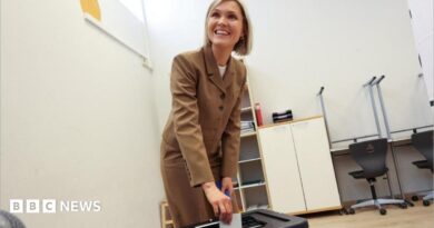 Iceland's Prime Minister Kristrun Frostadottir votes in the national referendum on resuming EU membership talks, at a polling station in Reykjavik