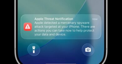 an Apple threat notification on an iPhone lock screen.