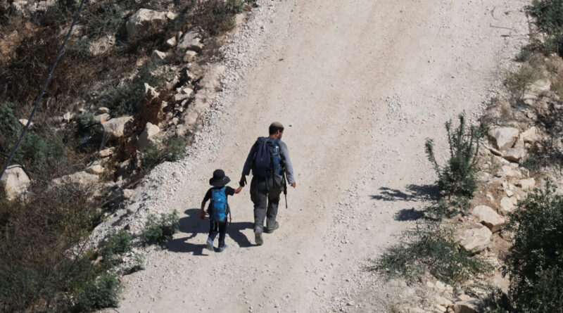 Israeli military cracks down on West Bank village as settlers march in
