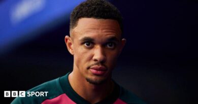 Trent Alexander-Arnold wearing Real Madrid training gear at the Santiago Bernabeu stadium