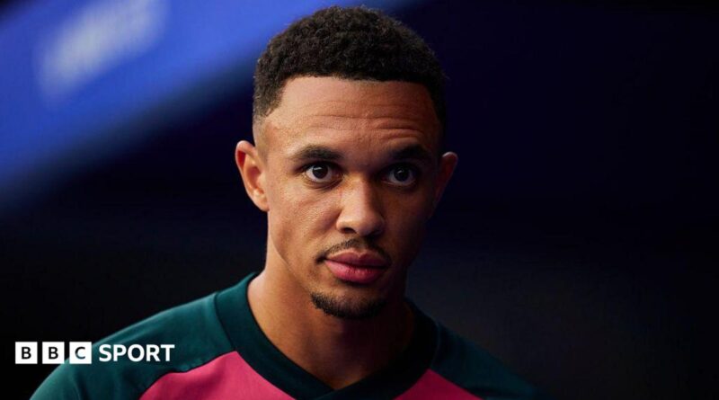Trent Alexander-Arnold wearing Real Madrid training gear at the Santiago Bernabeu stadium