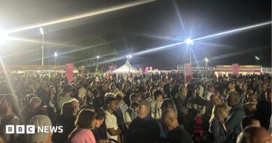 Thousands of people stood outside the Alexander Stadium 