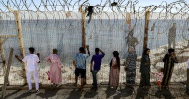 Moroccans gather at Ceuta border, desperate for news of loved ones
