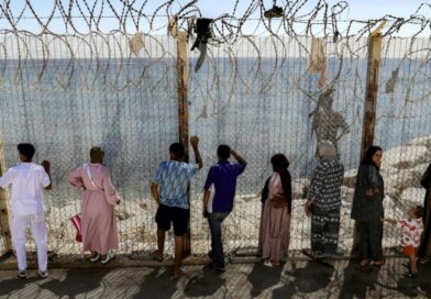Moroccans gather at Ceuta border, desperate for news of loved ones