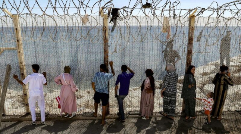 Moroccans gather at Ceuta border, desperate for news of loved ones