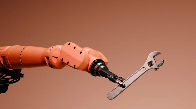 Conceptual image of a robotic arm holding a wrench.