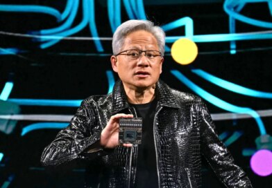 Jensen Huang holds up chip at CES 2025