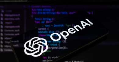 The OpenAI logo is displayed on a smartphone screen placed on a reflective surface onto which lines of computer code.