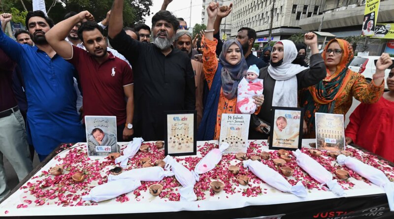 Pakistan suspends eight officials over hospital fire that killed 14 babies