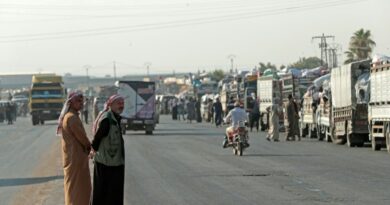 Return of displaced Syrian Kurds to hometown suspended after violence