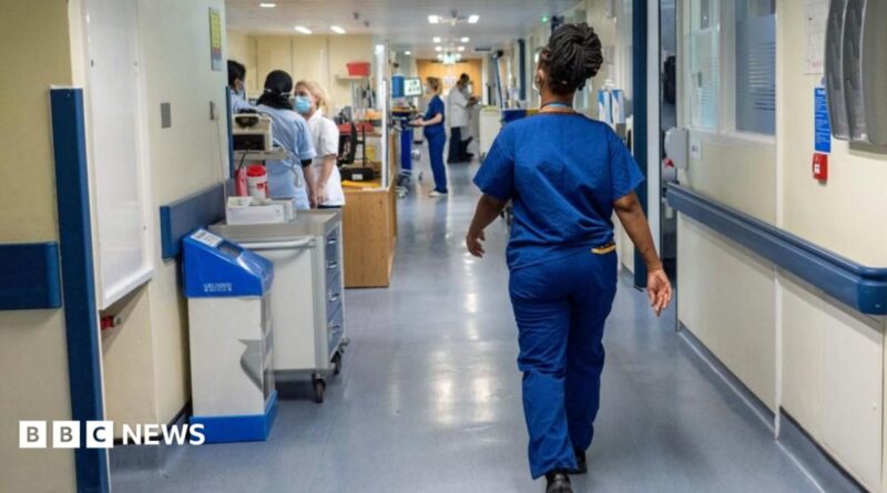 Medical staff walking in a hospital corridor