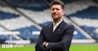 Sebastien Pocognoli poses for photographs at Hampden Park