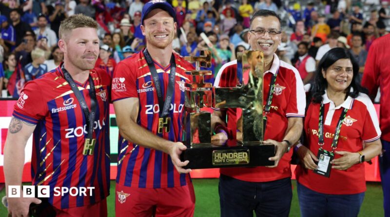 Manchester Super Giants captain Jos Buttler and owner Sanjiv Goenka hold up the 2026 men's Hundred trophy, with opener Tim Seifert (left) and Goenka's wife Preeti (right) flanking them