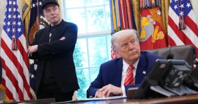 Tesla CEO Elon Musk and U.S. President Donald Trump listen to a question from reporters in the Oval Office of the White House.