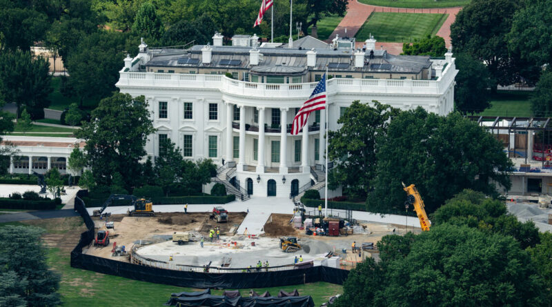 Trump the builder carves his legacy in stone as pressures mount