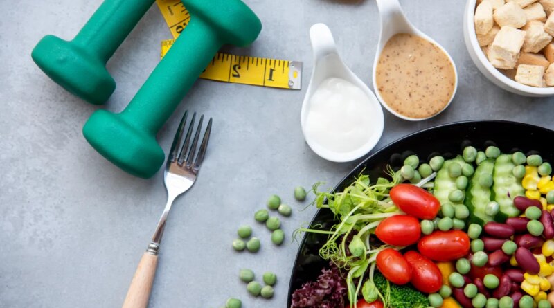 healthy food and hand weights