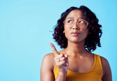 Confused woman, thinking bubble and studio mockup background. Pensive, annoyed or curious person contemplating decision. Girl with solution or idea pointing for marketing advertisement.