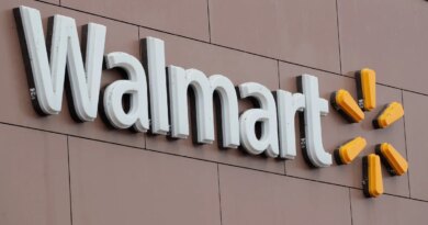 Walmart signage on store building.