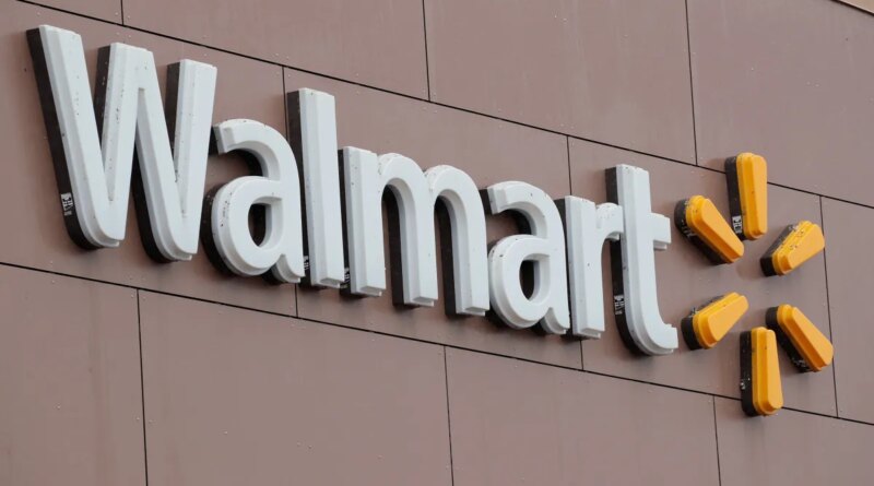 Walmart signage on store building.