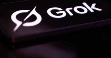 The Grok logo is displayed on a mobile phone screen