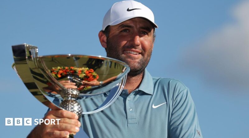Scottie Scheffler with the Fedex Cup