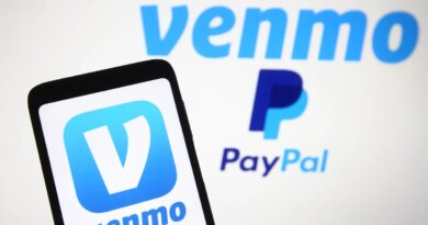 Venmo logo, a mobile payment service of PayPal is seen displayed on a smartphone and a PC screen.