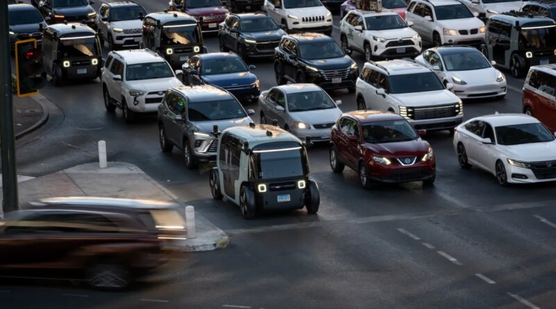 Zoox robotaxi in Vegas traffic