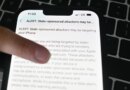 A Polish journalist iPhone displays an Apple alert saying "state sponsored attackers may be targeting your iPhone" on March 07, 2024 in Warsaw, Poland.
