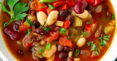 Three bean soup in a white bowl.