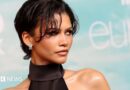 Zendaya attends the Los Angeles premiere of HBO's Euphoria season three - she is wearing a black halterneck dress and hoop earrings