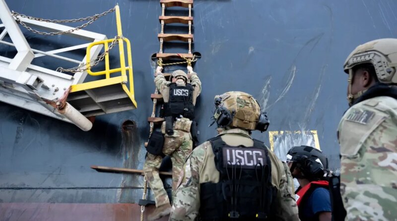 U.S. Coast Guard troops scaling ladder