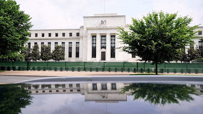 Fed should defy Donald Trump with rate rise, top economists say