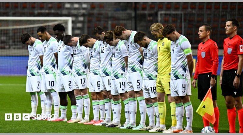 The Republic of Ireland squad bow their heads