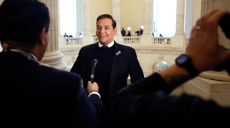 Rep. George Santos (R-NY) is interviewed by television news reporters in the rotunda of the Cannon House Office Building