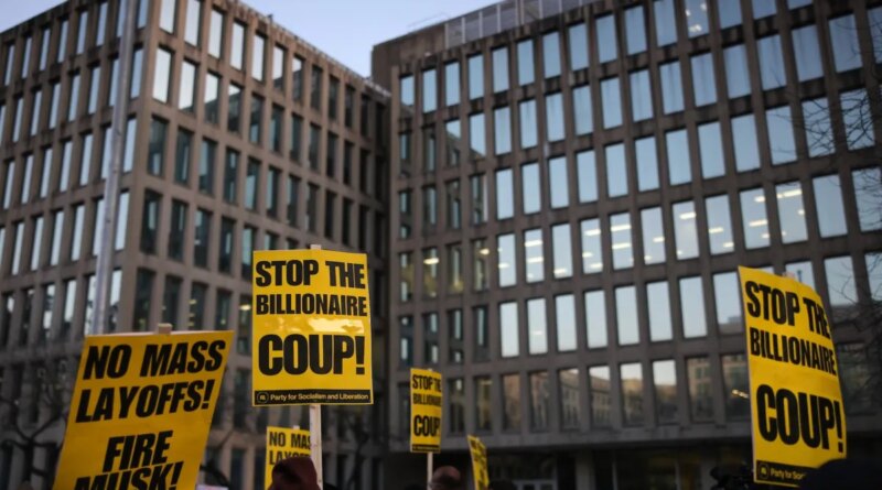 Demonstrators gather outside of the Office of Personnel Management in Washington, D.C. on February 7, 2025 to protest federal layoffs and demand the termination of Elon Musk from the Department of Government Efficiency (DOGE). (Photo by Bryan Dozier / Middle East Images / Middle East Images via AFP)