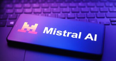 The Mistral AI logo appears on a smartphone screen in this photo illustration