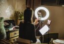 New California law will penalize influencers who don't disclose political ads | TechCrunch female influencer filming content using phone in a bedroom
