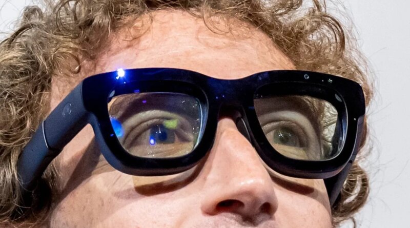 Mark Zuckerberg, chief executive officer of Meta Platforms Inc., wears Orion augmented reality (AR) glasses during the Meta Connect event in Menlo Park, California, US, on Wednesday, Sept. 25, 2024. Meta Platforms Inc. debuted its first pair of augmented reality glasses, devices that show a combined view of the digital and physical worlds, a key step in Chief Executive Officer Mark Zuckerberg's goal of one day offering a hands-free alternative to the smartphone. Photographer: David Paul Morris/Bloomberg via Getty Images