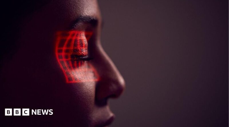 Facial Recognition Technology Concept As Woman Has Red Grid Projected Onto Eye In Studio