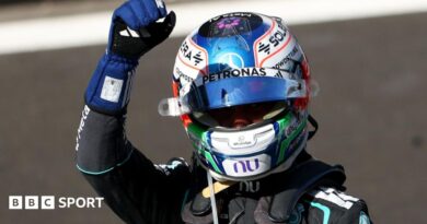 Kimi Antonelli clenches his fist in celebration after winning the Spanish Grand Prix