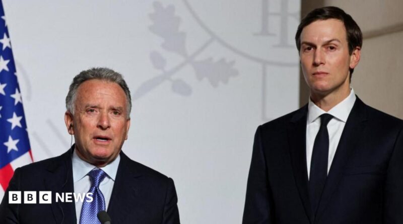 Steve Witkoff (left) and Jared Kushner (right) stand side by side looking directly towards the camera. They are both in black suits with white shirts. Witkoff has a blue patterned tie and Kushner has a black tie