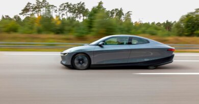 A side view of a prototype car.