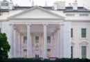 A protective tarp with a photo on it covers the scaffolding and the columns on the North Portico of the White House on July 18, 2026 in Washington, DC..